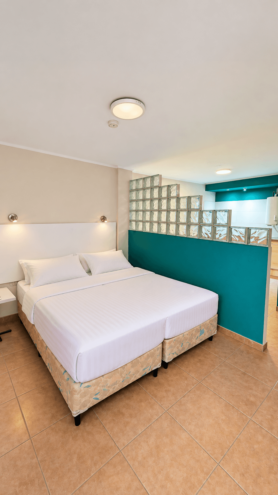 Otro dormitorio fotografiado en el sector de apart y dúplex
